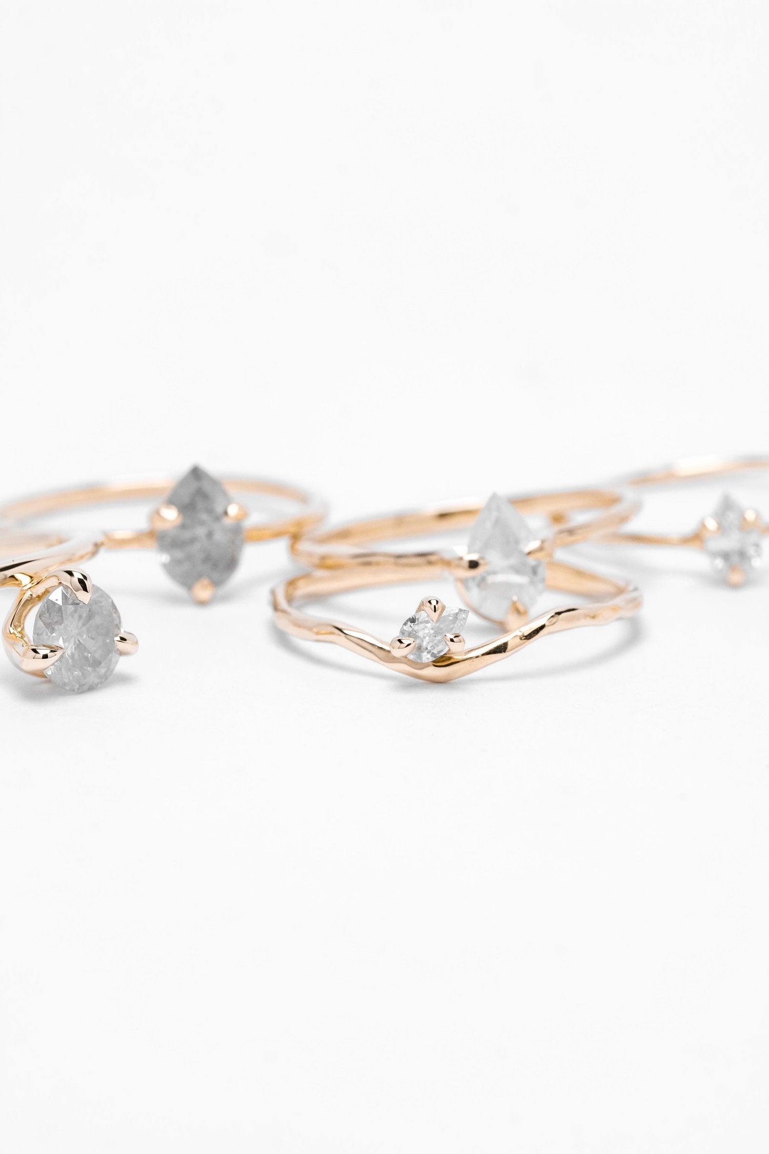 TINY LINE PEAR SOLITAIRE 0.08CT